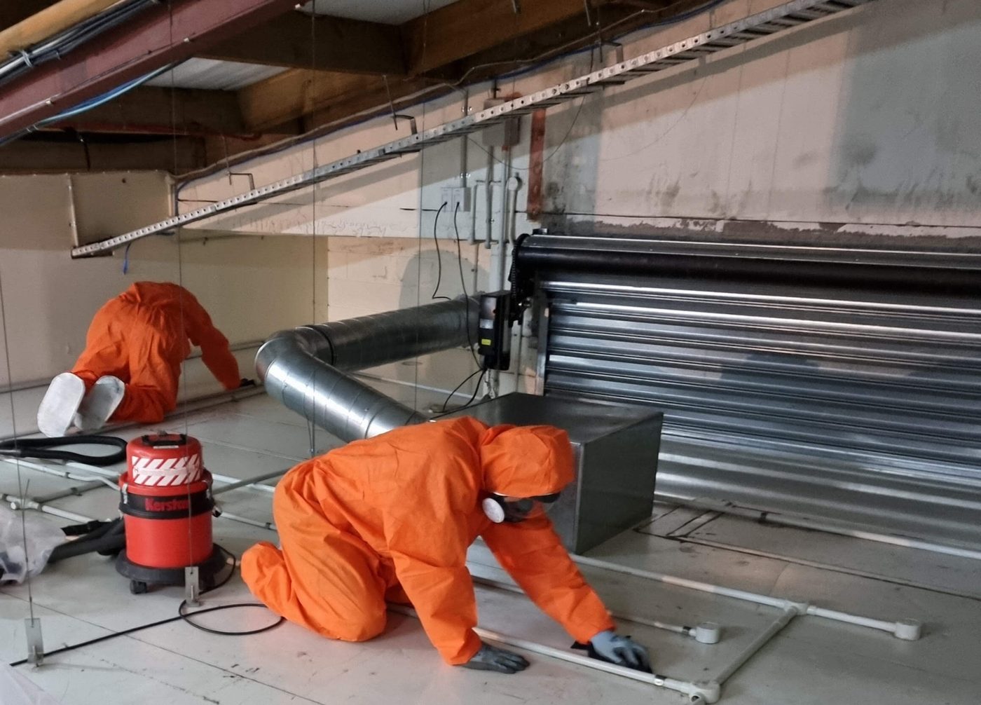 Super Six asbestos roof sheets being removed from scaffold