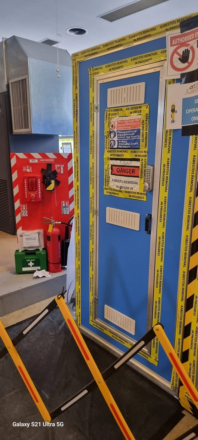 Doors and fittings tagged for salvage before deconstruction