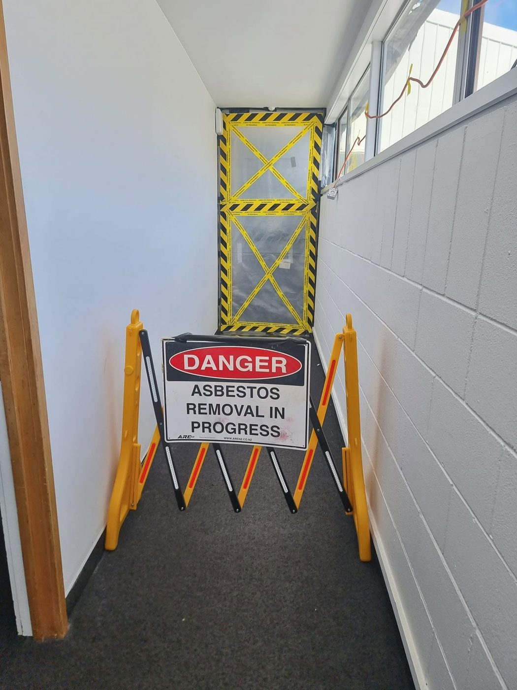 Danger signage and barrier at the enclosure