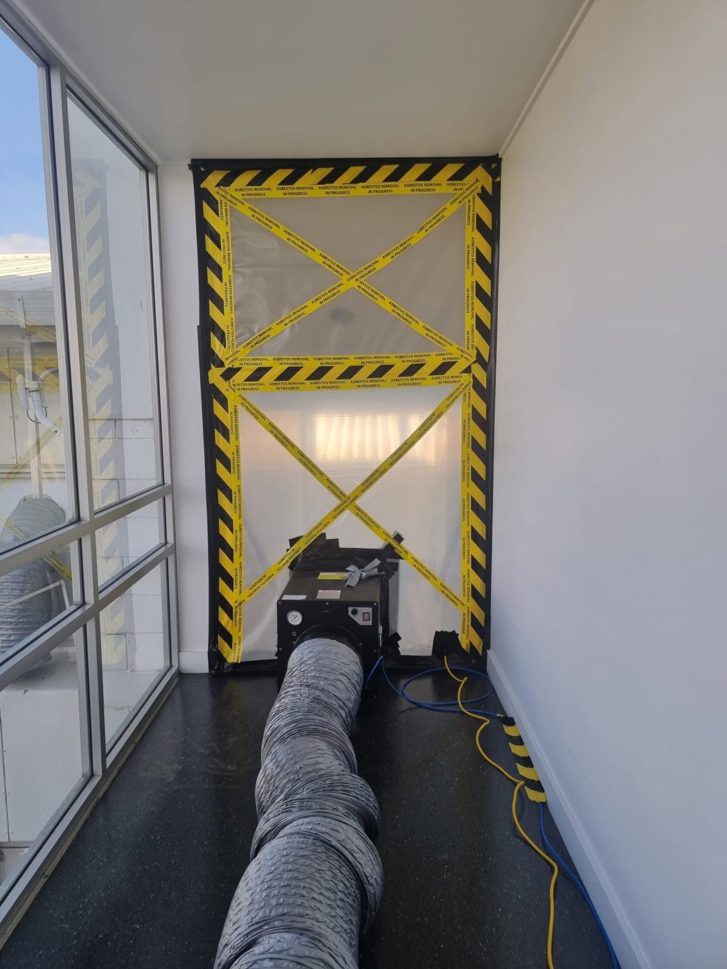 Negative-air ducting from the enclosure