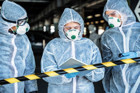 SES Specialist Cleaning technicians in full PPE beginning a remediation job in Auckland